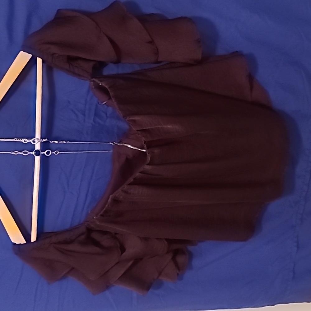 Woman off shoulder boustiea stylish top. Deep Maroon in color. Great condition